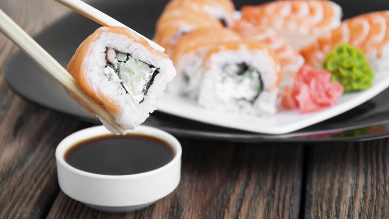 Salty foods, such as soy sauce eaten with sushi, contribute to high sodium levels in Asian diets.