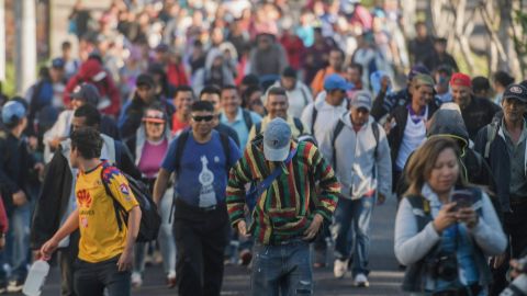 Salvadoran migrants begin their journey in caravan heading the United States, in San Salvador, on November 18, 2018. - The migrants are mostly fleeing poverty and unrest in Central America's "Northern Triangle" -- El Salvador, Guatemala and Honduras, where brutal gang violence has fuelled some of the highest murder rates in the world. (Photo by MARVIN RECINOS / AFP) (Photo credit should read MARVIN RECINOS/AFP/Getty Images)