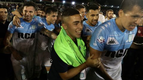 Racing Club players celebrate just the club's third league title since 1966.