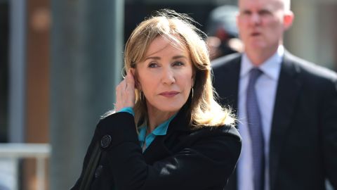 Actress Felicity Huffman arrives Wednesday at federal court in Boston.