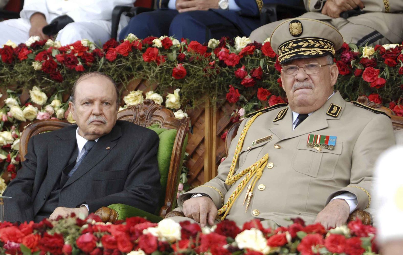 Bouteflika sits beside his Army chief of staff, Gen. Ahmed Gaid Salah, during a military parade in Cherchell, Algeria, in June 2012.