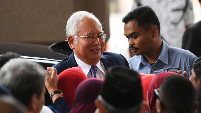 Malaysia's former prime minister Najib Razak (C) arrives at a court for his trial over 1MDB corruption allegations in Kuala Lumpur on April 3, 2019. (Photo by Mohd RASFAN / AFP)        (Photo credit should read MOHD RASFAN/AFP/Getty Images)