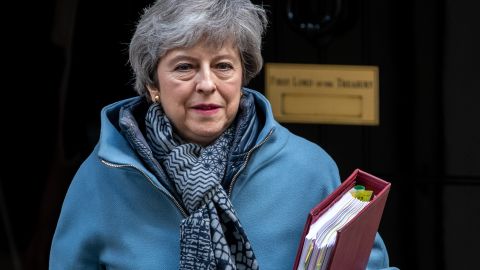 British Prime Minister Theresa May leaves Downing Street for Prime Minister's Questions.
