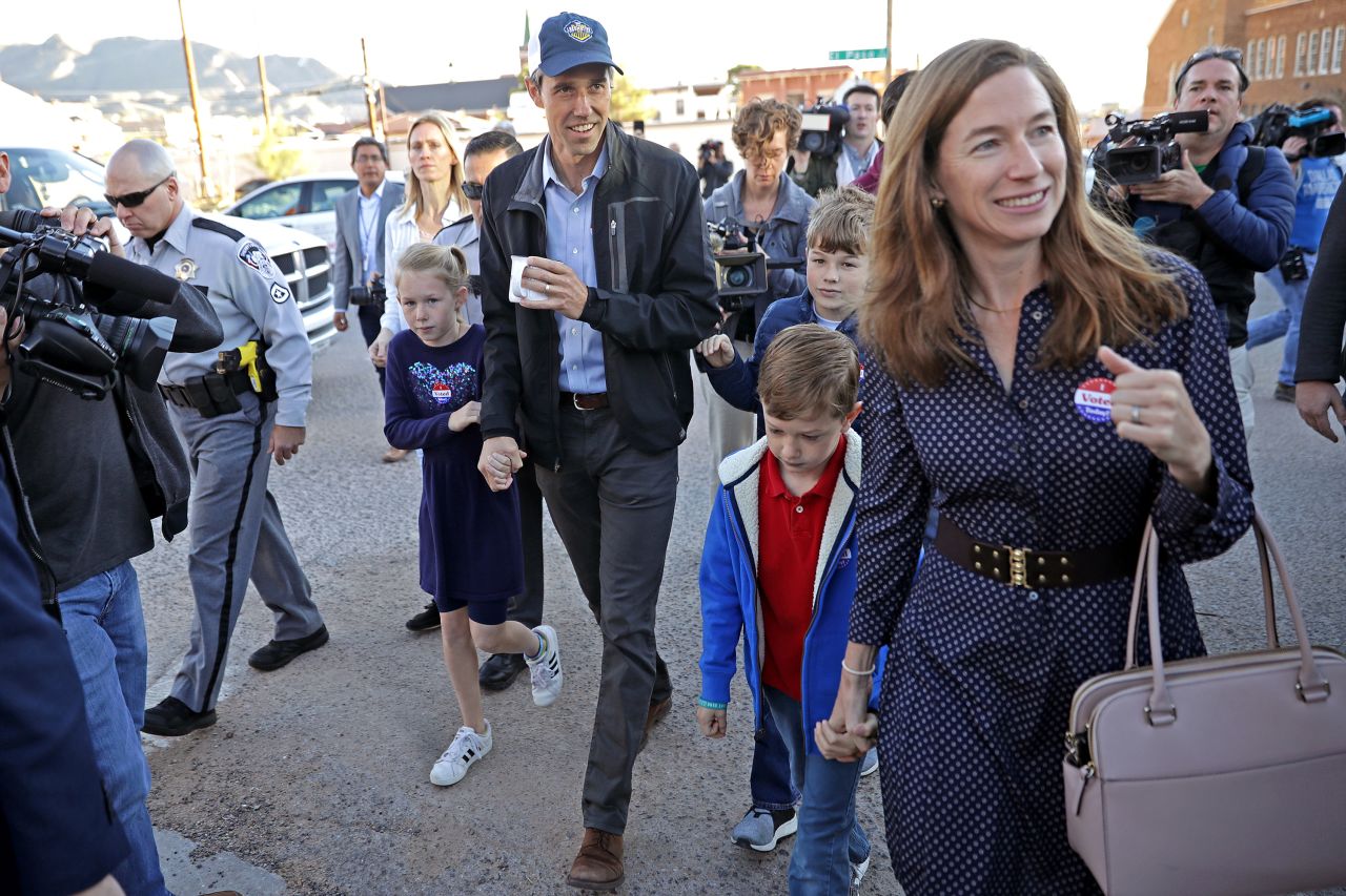 The O'Rourkes walk home after voting in El Paso in November 2018.