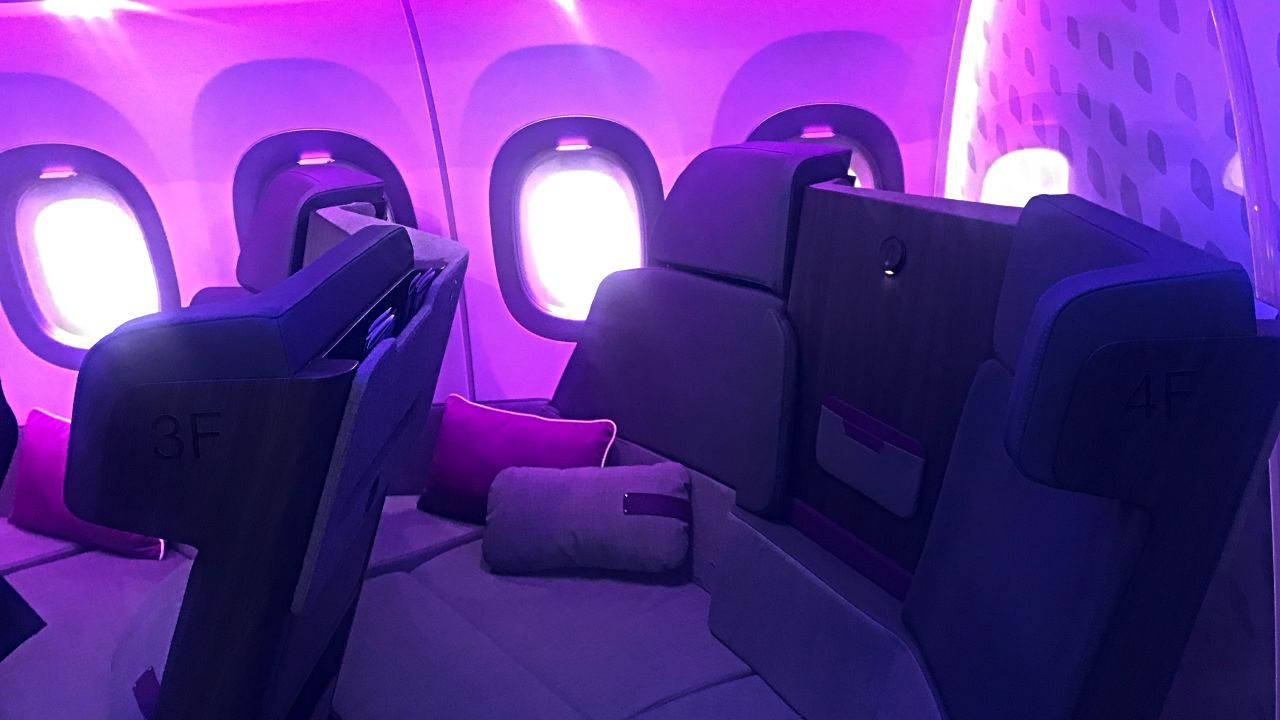 <strong>Multi-faceted space:</strong> "We've got all features that you would find in a business class seat," says Martinez Martin. There's the personalized TV screen, a spot to stow belongings -- and, for those traveling with someone else, they can come and share the sofa.