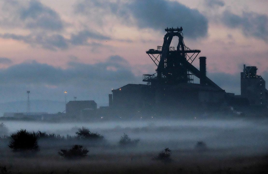 Dawn breaks over the blast furnace at the SSI steel plant.