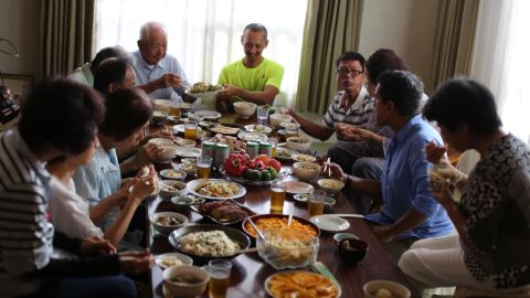 Dr. Sanjay Gupta joins a family meal in Okinawa, Japan.
