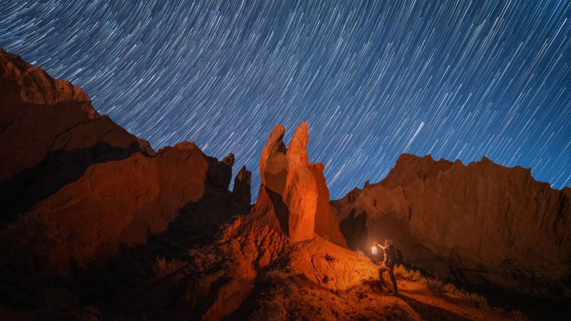 Dros uses software in post-production to create star trails from multiple shots.