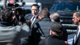 Elon Musk, chief executive officer of Tesla Inc., arrives at federal court in New York, U.S., on Thursday, April 4, 2019. The SEC says Musk violated his agreement with the agency when he tweeted on February 19 that Tesla would make about half a million cars in 2019, before tweeting a few hours later that deliveries would only reach about 400,000. Photographer: Jeenah Moon/Bloomberg via Getty Images