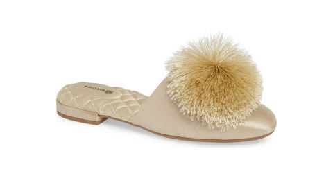 <strong>The Songbird Slipper, Gold Satin ($140;</strong><a href="https://click.linksynergy.com/deeplink?id=Fr/49/7rhGg&mid=1237&u1=0405birdies&murl=https%3A%2F%2Fshop.nordstrom.com%2Fs%2Fbirdies-the-songbird-slipper-women%2F5105381%3Forigin%3Dcategory-personalizedsort%26breadcrumb%3DHome%252FWomen%252FShoes%252FSlippers%26color%3Dgold%2520satin" target="_blank" target="_blank"><strong> nordstrom.com</strong></a><strong>)</strong>