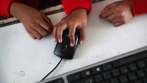 Third graders work in the computer lab on February 14, 2017 at a primary school in Guatemala City, Guatemala. (Photo by John Moore/Getty Images)