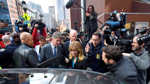 Actor Felicity Huffman leaves the federal courthouse after facing charges in a nationwide college admissions cheating scheme in Boston, Massachusetts, U.S., April 3, 2019. REUTERS/Gretchen Ertl TPX IMAGES OF THE DAY