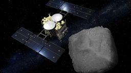 An artist's impression of the Hayabusa probe arriving at the Ryugu asteroid.
