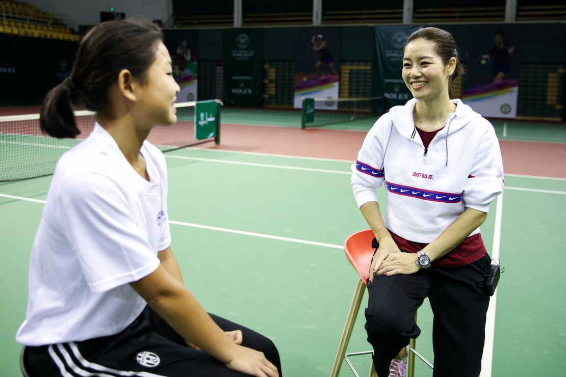 Li Na's grand slam breakthrough at the 2011 French Open led to a tennis revolution in China, which has invested heavily in growing the game both on a grass-roots and elite level. Here Li is talking to one of China's top junior players in March in Beijing.