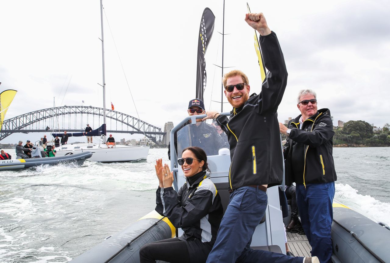 Meghan and Harry cheer on sailors during the Invictus Games in Australia in October 2018.