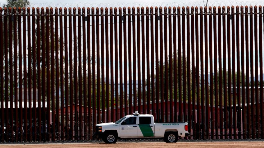 A U.S. Customs and Border Protection vehicle sits near the wall as President Donald Trump visits a new section of the border wall with Mexico in Calexico, Calif., Friday April 5, 2019. (AP Photo/Jacquelyn Martin)