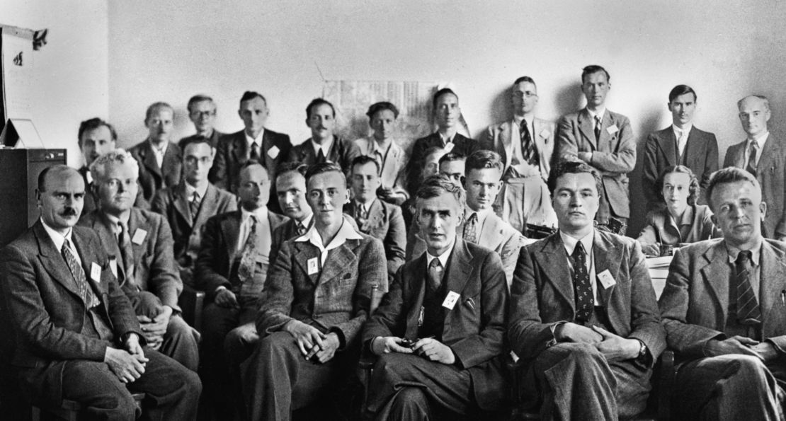 Eric Burhop (seated, fourth from left, partially obscured) and the rest of the British Group associated with the Manhattan Project, also known as the Mark Oliphant Group