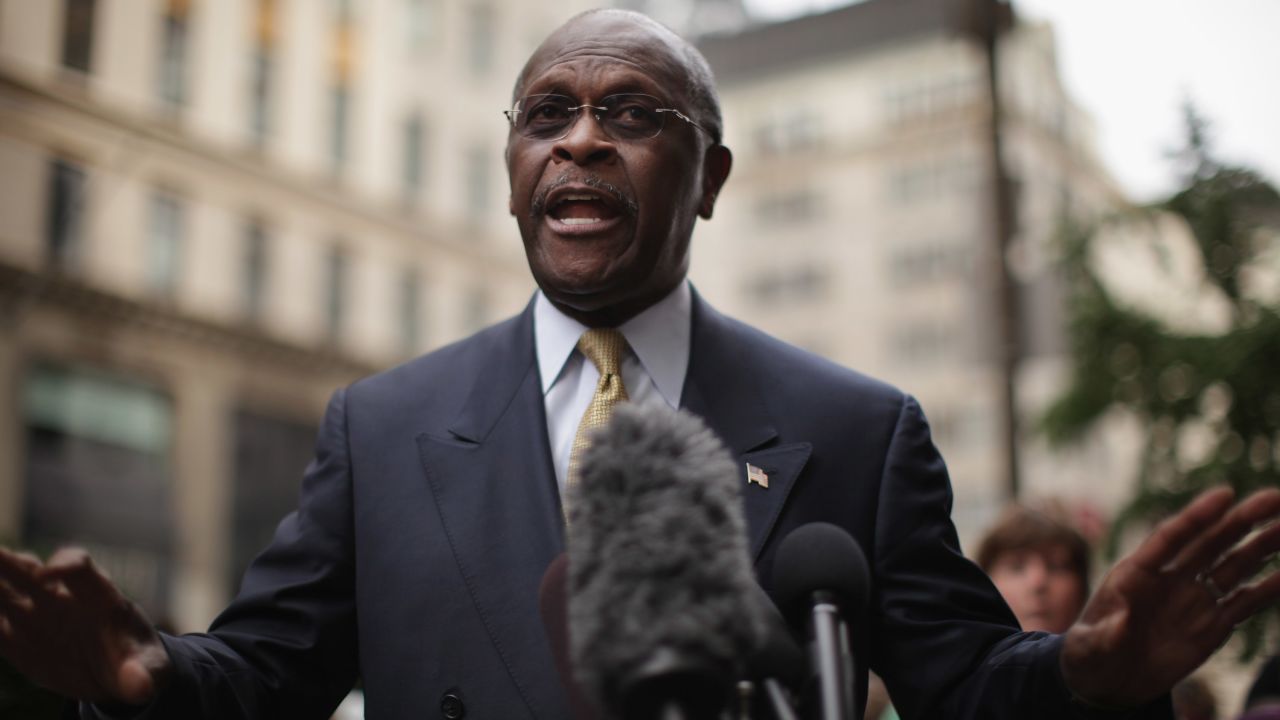 Republican presidential candidate Herman Cain speaks to the media outside of Trump Towers before a scheduled appearance with real estate mogul Donald Trump on October 3, 2011 in New York City.