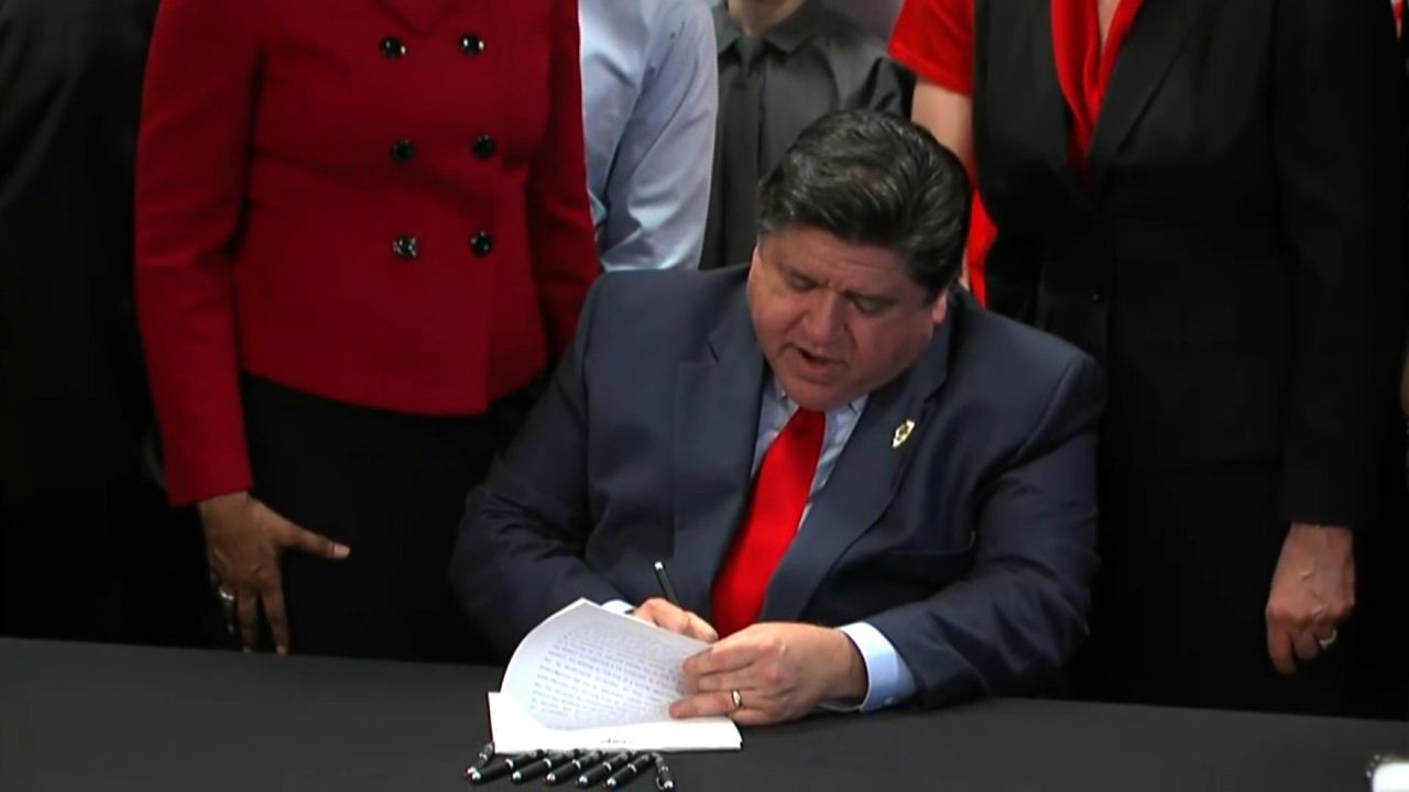 Gov. JB Pritzker signs legislation raising the age for buying tobacco products.