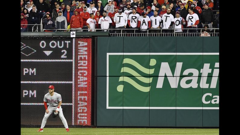 Washington Nationals fans taunt Philadelphia Phillies right fielder Bryce Harper with shirts that spell out 'Traitor' during the third inning of a baseball game at Nationals Park on Tuesday, April 2. Harper, who played for the Nationals from 2012-2018, <a href="index.php?page=&url=https%3A%2F%2Fbleacherreport.com%2Farticles%2F2736846-bryce-harper-phillies-reportedly-agree-to-13-year-330-million-contract" target="_blank" target="_blank">signed a $330 million contract</a> with the Phillies during the offseason.