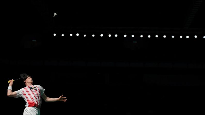Denmark's Anders Antonsen hits a return against China's Shi Yuqi during their men's singles match at the Malaysia Open badminton tournament in Kuala Lumpur on April 4.