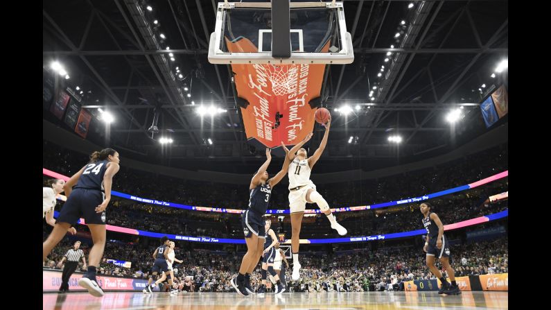 Brianna Turner of the Notre Dame Fighting Irish shoots over Megan Walker of the UConn Huskies at Amalie Arena on April 5 in Tampa. <a href="index.php?page=&url=https%3A%2F%2Fwww.cnn.com%2F2019%2F04%2F05%2Fsport%2Fncaa-womens-final-four-baylor-oregon-notre-dame-uconn%2Findex.html" target="_blank">The Irish defeated the Huskies</a> 81-76 to reach the championship game for the second year in a row.