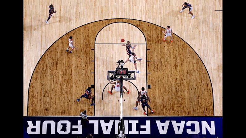 Auburn Tigers guard Samir Doughty shoots the ball against Virginia Cavaliers guard Ty Jerome during the second half their Final Four game at US Bank Stadium in Minneapolis on April 6.