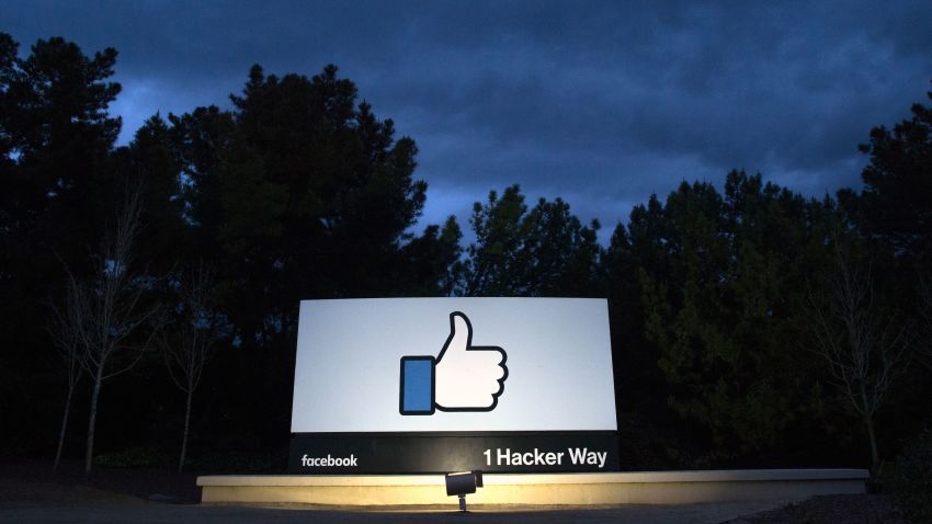 TOPSHOT - A lit sign is seen at the entrance to Facebook's corporate headquarters location in Menlo Park, California on March 21, 2018. 
Facebook chief Mark Zuckerberg vowed on March 21 to "step up" to fix problems at the social media giant, as it fights a snowballing scandal over the hijacking of personal data from millions of its users. / AFP PHOTO / JOSH EDELSON        (Photo credit should read JOSH EDELSON/AFP/Getty Images)