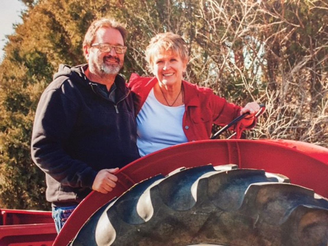 Randy Wenger with his wife on his family farm in Colorado.