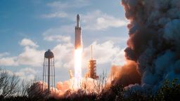The SpaceX Falcon Heavy launches from Pad 39A at the Kennedy Space Center in Florida, on February 6, 2018, on its demonstration mission.
The world's most powerful rocket, SpaceX's Falcon Heavy, blasted off Tuesday on its highly anticipated maiden test flight, carrying CEO Elon Musk's cherry red Tesla roadster to an orbit near Mars. Screams and cheers erupted at Cape Canaveral, Florida as the massive rocket fired its 27 engines and rumbled into the blue sky over the same NASA launchpad that served as a base for the US missions to Moon four decades ago.