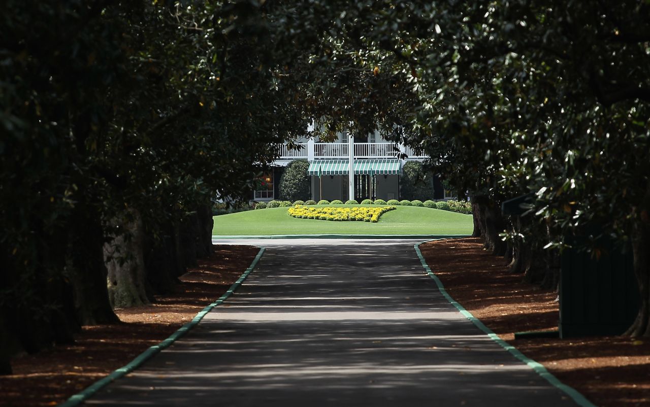 The exclusive driveway to Augusta's historic clubhouse is framed by dozens of magnolia trees. Only members and Masters competitors are allowed to access this revered entrance which gives on to the Founder's Circle and then the whitewashed concrete clubhouse, built in 1854. 