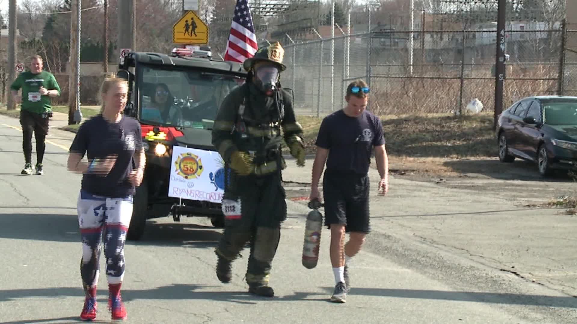 Ryan Robeson tried to set a Guinness World Record for running a half marathon in full firefighter gear. 