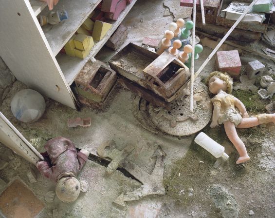Photos of playgrounds and slides also provide pertinent symbols of time's passing. The children that once played there will now be in their thirties or forties.