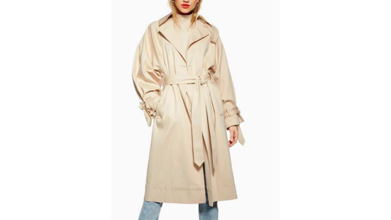 <strong>Ultimate Cream Trench Coat ($190; </strong><a href="https://click.linksynergy.com/deeplink?id=Fr/49/7rhGg&mid=35861&u1=0518personalitymothers&murl=http%3A%2F%2Fus.topshop.com%2Fen%2Ftsus%2Fproduct%2Fclothing-70483%2Fworkwear-suits-6924741%2Fultimate-cream-trench-coat-8572661" target="_blank" target="_blank"><strong>topshop.com</strong></a><strong>)</strong><br />