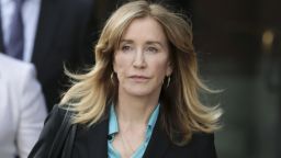 Actress Felicity Huffman departs federal court in Boston on Wednesday, April 3, 2019, after facing charges in a nationwide college admissions bribery scandal. (AP Photos/Charles Krupa)