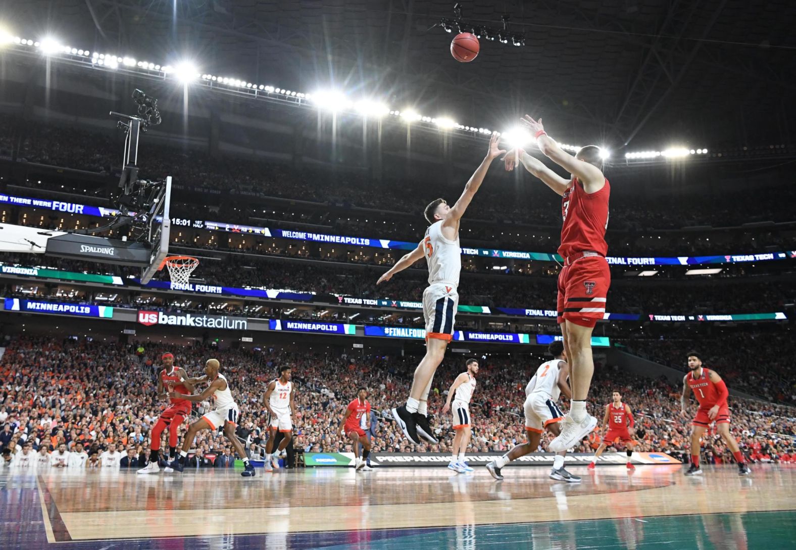 Mooney shoots over Guy.