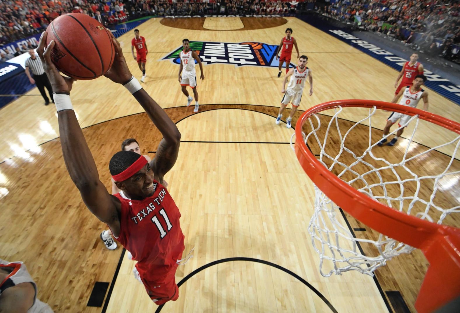 Texas Tech's Tariq Owens rises for a dunk.