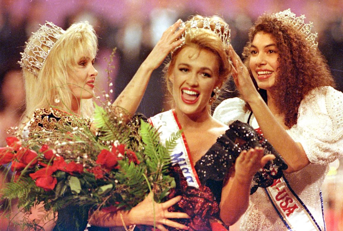 Miss California Shannon Marketic, center, reacts as she is crowned Miss USA 1992.