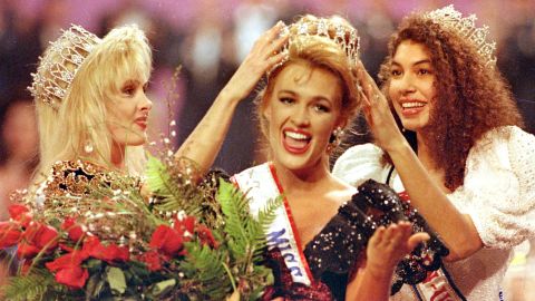 Miss California Shannon Marketic, center, reacts as she is crowned Miss USA 1992.