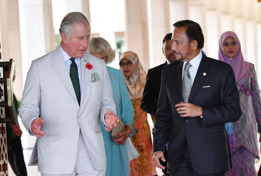 Britain's Prince Charles walks with the sultan of Brunei as they attend a high tea at the sultan's palace in Bandar Seri Begawan, Brunei, in 2017.