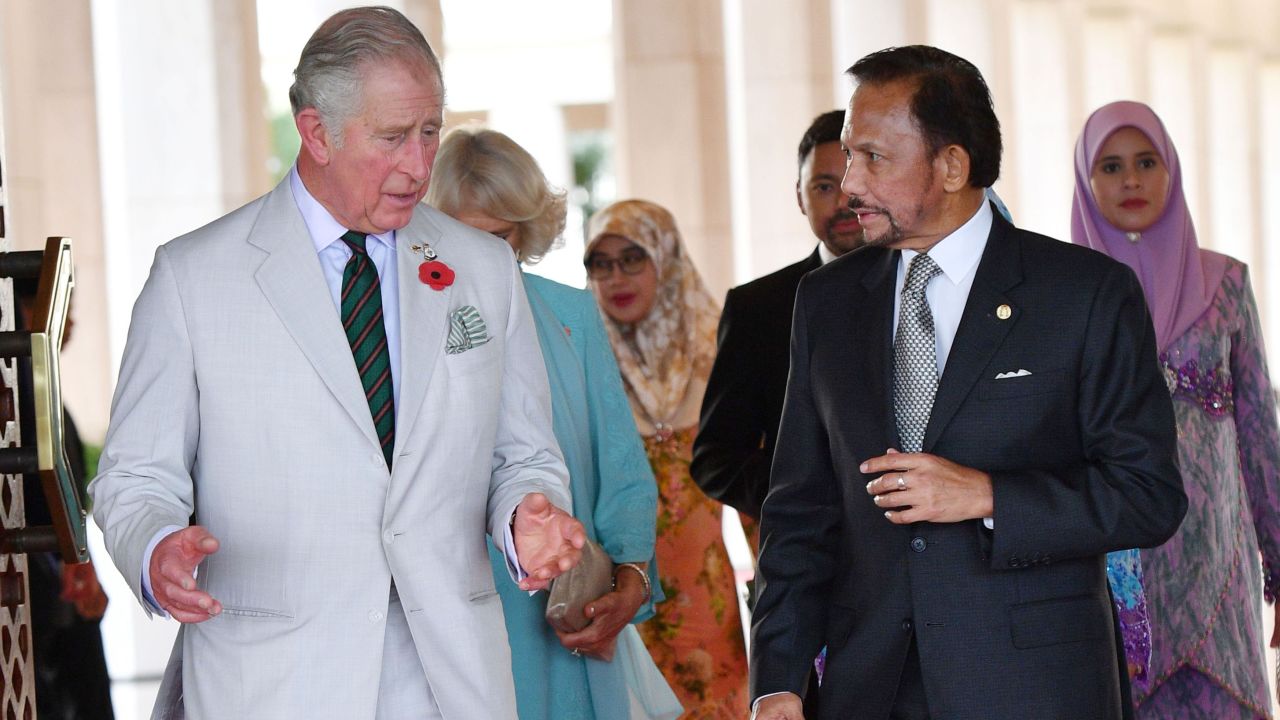 Britain's Prince Charles walks with the sultan of Brunei as they attend a high tea at the sultan's palace in Bandar Seri Begawan, Brunei, in 2017.