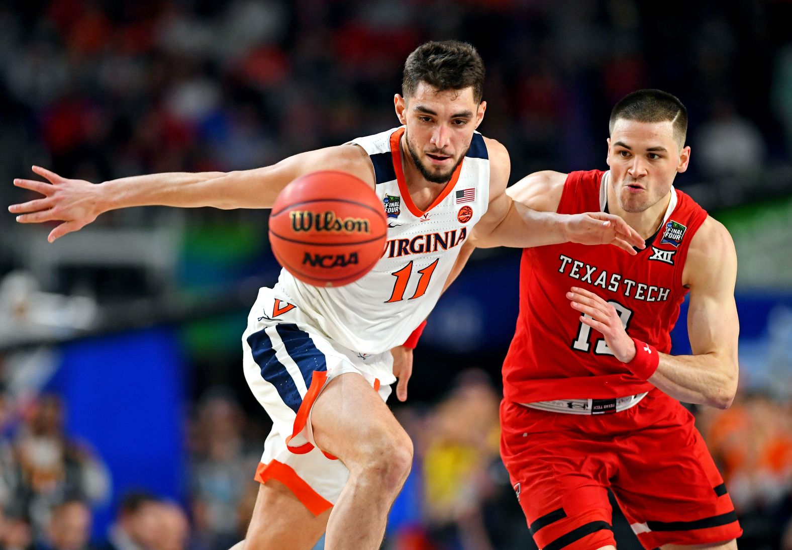 Jerome and Texas Tech's Matt Mooney go for a loose ball in the second half.
