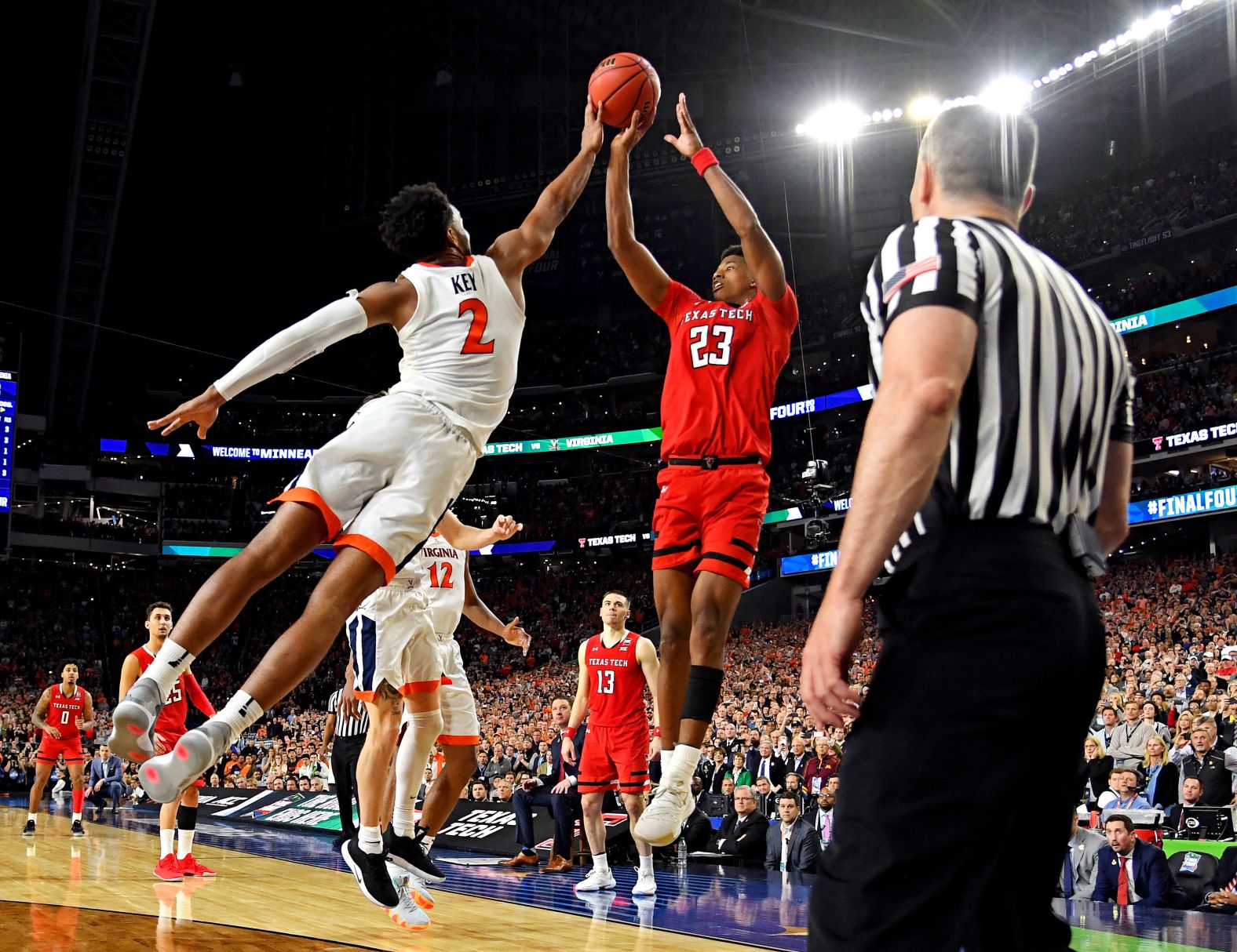 Virginia's Braxton Key blocks the shot of Jarrett Culver on the last play of regulation.