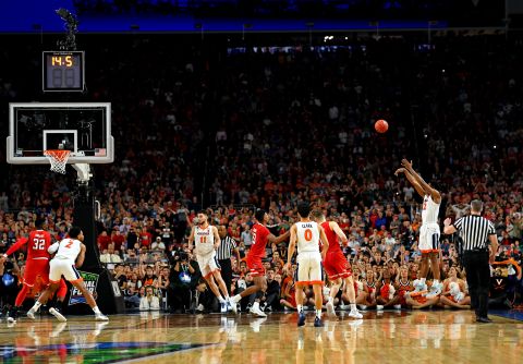 Virginia's De'Andre Hunter hits a game-tying 3-pointer late in the second half. Hunter had a game-high 27 points.
