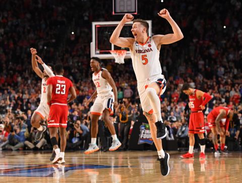 Kyle Guy, foreground, and the Virginia Cavaliers celebrate after winning the NCAA tournament final on Monday, April 8.