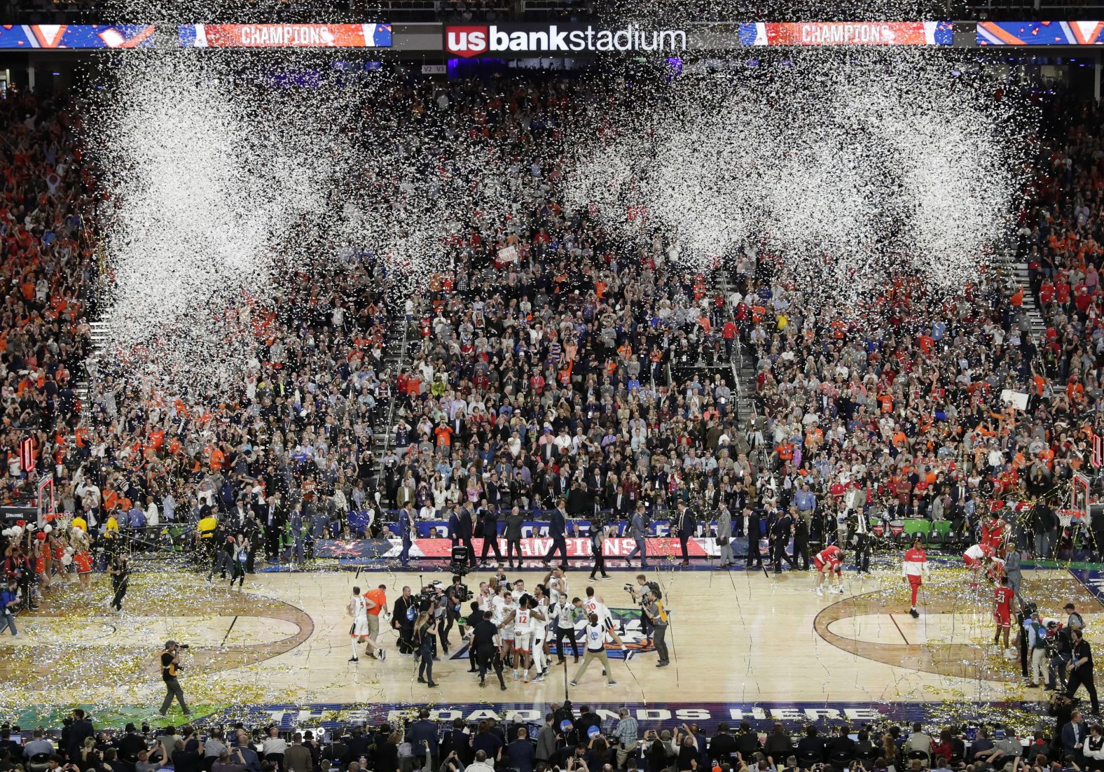 Virginia players celebrate after the final buzzer.