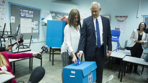 Benny Gantz and his wife, Revital, cast thier ballot at a polling station in Rosh Ha'ayin.