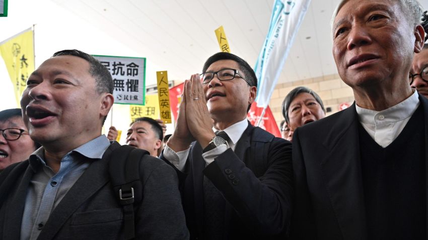 Baptist minister Chu Yiu-ming (R), law professor Benny Tai (L) and sociology professor Chan Kin-man (C) react as they enter the West Kowloon Magistrates Court in Hong Kong on April 9, 2019, to find out if they face jail for their involvement in the 2014 Umbrella Movement protests. - They are among nine activists facing rarely used colonial-era public nuisance charges for their participation in the 2014 protests calling for free elections for the city's leader. (Photo by Anthony WALLACE / AFP)        (Photo credit should read ANTHONY WALLACE/AFP/Getty Images)