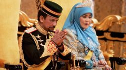 Sultan of Brunei Hassanal Bolkiah and his wife during a ceremony at Istana Palace in Bandar Seri Begawan, Brunei Darussalam on July 15, 2005. 