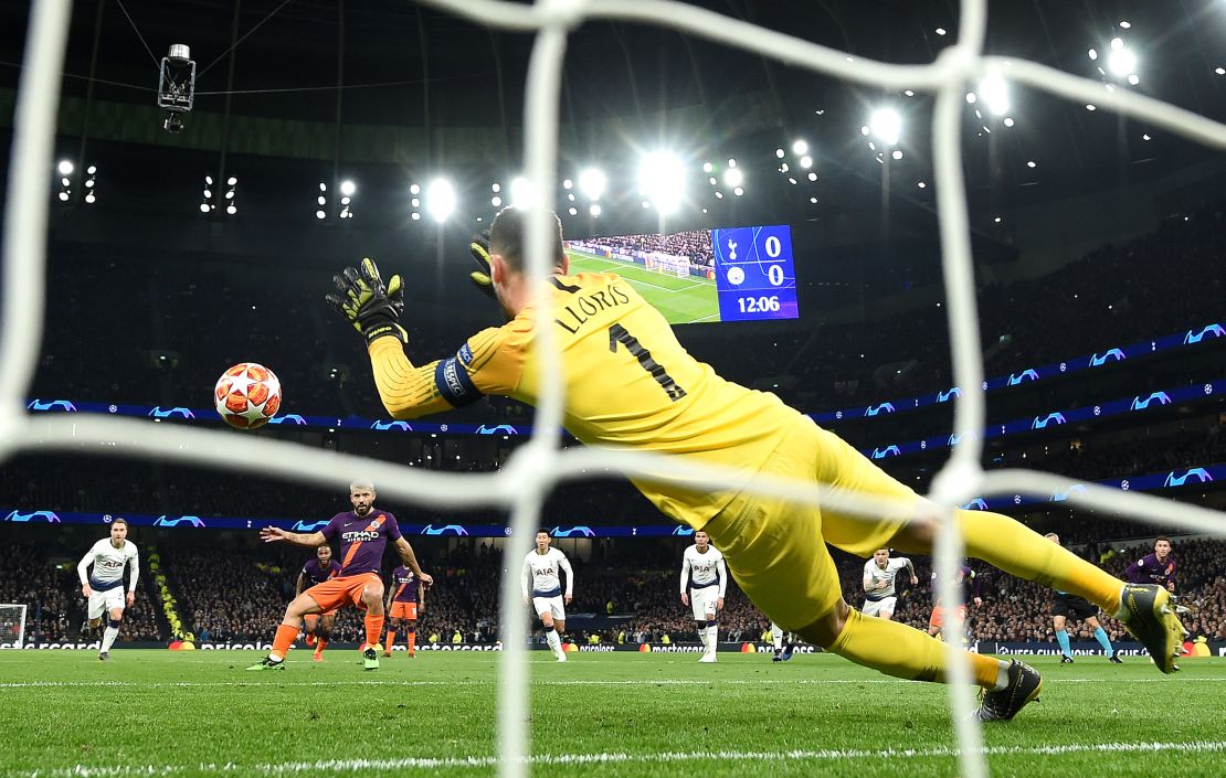 Hugo Lloris saves Sergio Aguero's first-half penalty.